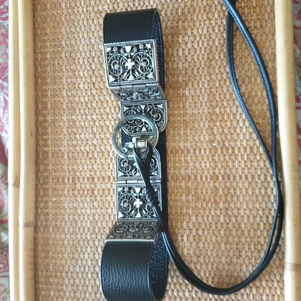 Unique black leather belt.
